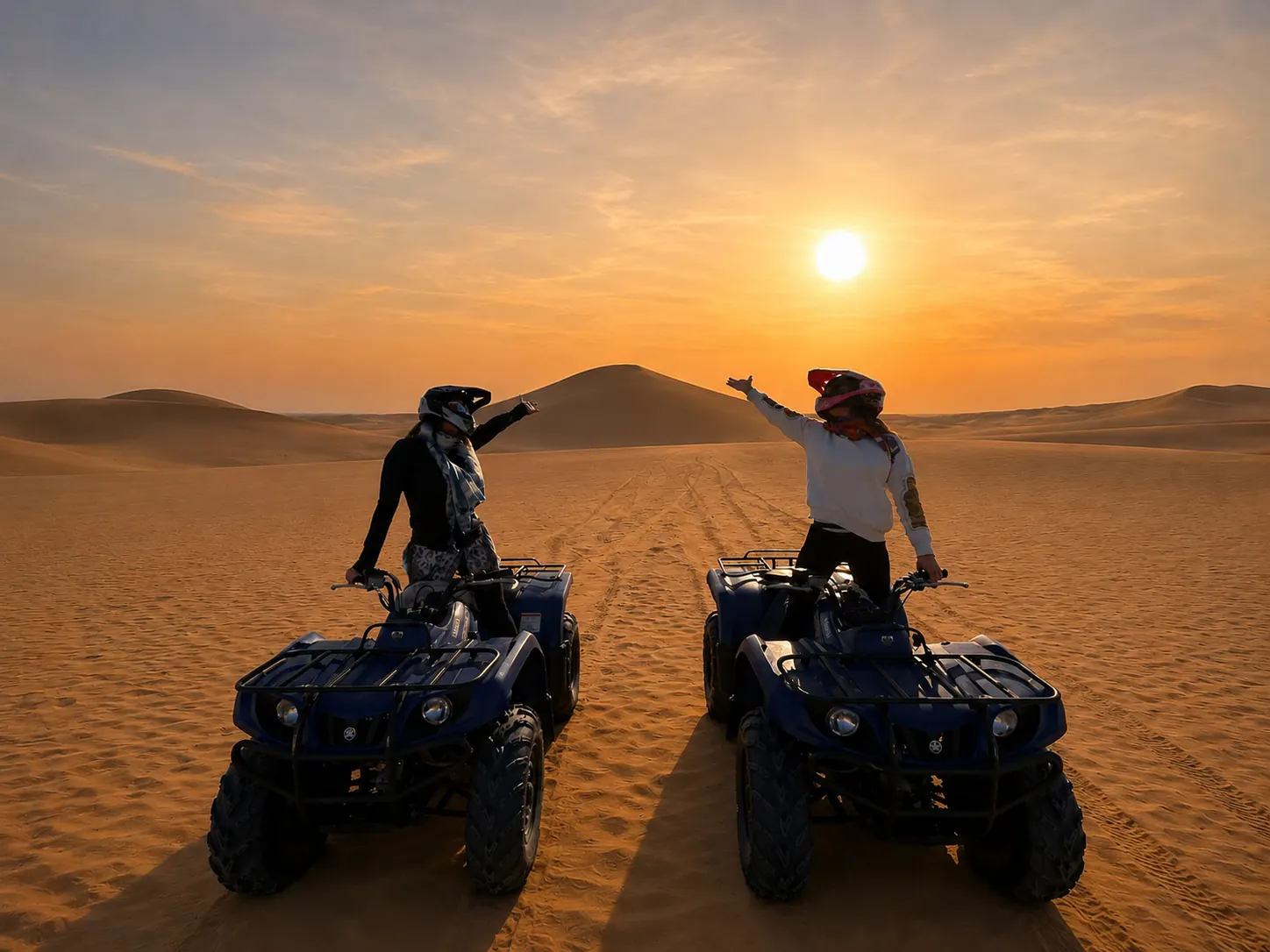 Two riders on ATVs facing each other on the Agafay desert at golden sunset