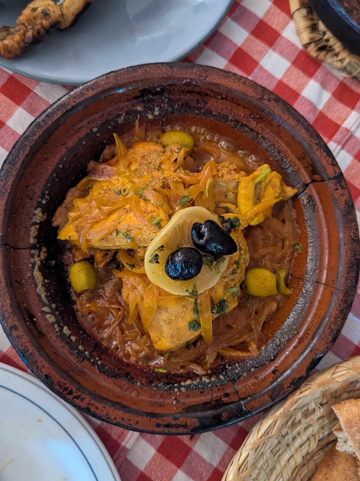Traditional Moroccan chicken tagine served in a clay pot